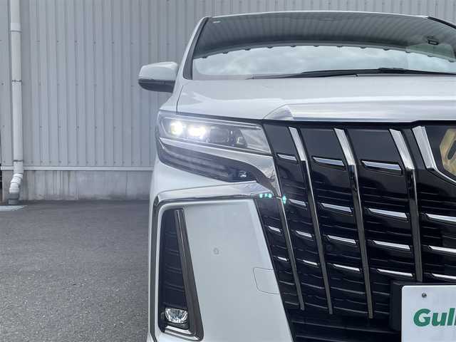 トヨタ アルファード S タイプゴールド 神奈川県 2021(令3)年 3.2万km ホワイトパールクリスタルシャイン 純正９インチディスプレイオーディオ　/CD/DVD/Bluetooth/USB/フルセグ　/バックカメラ　/ビルトインＥＴＣ２．０　/ツインムーンルーフ　/１３．３インチ後席モニター　/両側パワースライドドア　/デジタルインナーミラー　/レーダークルーズコントロール/電子パーキング/ブレーキホールド/デジタルインナーミラー/MTモード付AT/電動リアゲート/WAC/ハーフレザーシート/オットマン/プッシュスタート/オートライト/オートマチックハイビーム/W＋サイドエアバッグ/１００V充電/スマートキー/純正フロアマット/ABS/横滑り防止装置/レーンキープアシスト/LEDヘッドライト/衝突被害軽減システム