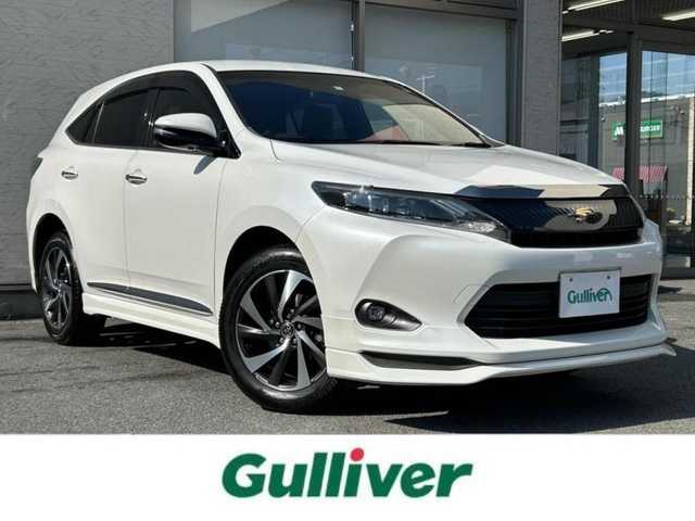 トヨタ ハリアー エレガンス 大阪府 2014(平26)年 11.1万km ホワイトパールクリスタルシャイン 純正８インチナビ/（フルセグ／ＢＴ／ＣＤ／ＤＶＤ）/バックモニター/アイドリングストップ/横滑り防止/純正18インチAW/ブラックハーフレザーシート/運転席パワーシート/オートライト/電動格納ミラー/ETC/スペアキー