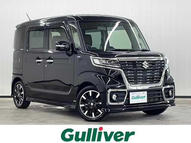 スズキ スペーシア カスタム HYBRID XS 長崎県 2018(平30)年 4.6万km ブルーイッシュブラックパール3 社外７インチナビ(CN-RA04WD)/（フルセグ/CD/DVD/Bluetooth）/バックカメラ/両側パワースライドドア/横滑り防止装置/LEDヘッドライト/純正15インチアルミホイール/運転席シートヒーター/シートバックテーブル/リアサンシェード/黒革ハンドル/純正フロアマット/純正バイザー/電格ウィンカーミラー/フォグライト/オートライト/保証書/取扱説明書
