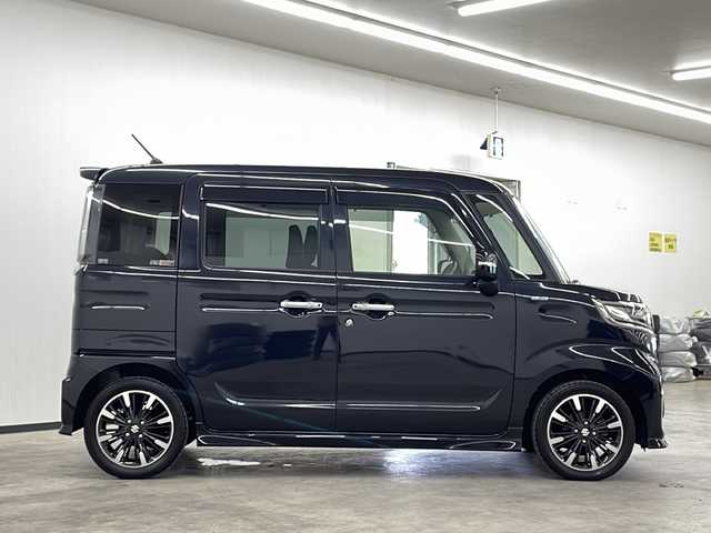 スズキ スペーシア カスタム HYBRID XS 長崎県 2018(平30)年 4.6万km ブルーイッシュブラックパール3 社外７インチナビ(CN-RA04WD)/（フルセグ/CD/DVD/Bluetooth）/バックカメラ/両側パワースライドドア/横滑り防止装置/LEDヘッドライト/純正15インチアルミホイール/運転席シートヒーター/シートバックテーブル/リアサンシェード/黒革ハンドル/純正フロアマット/純正バイザー/電格ウィンカーミラー/フォグライト/オートライト/保証書/取扱説明書