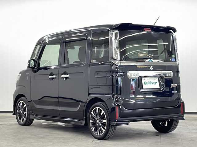 スズキ スペーシア カスタム HYBRID XS 長崎県 2018(平30)年 4.6万km ブルーイッシュブラックパール3 社外７インチナビ(CN-RA04WD)/（フルセグ/CD/DVD/Bluetooth）/バックカメラ/両側パワースライドドア/横滑り防止装置/LEDヘッドライト/純正15インチアルミホイール/運転席シートヒーター/シートバックテーブル/リアサンシェード/黒革ハンドル/純正フロアマット/純正バイザー/電格ウィンカーミラー/フォグライト/オートライト/保証書/取扱説明書