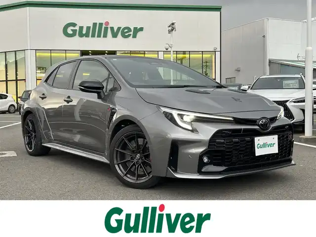 トヨタ ＧＲカローラ RZ 愛媛県 2023(令5)年 2.3万km ガンＭ 登録時走行距離:22537km/4WD/純正10.5型MOPナビ/フルセグTV/バックモニター/ビルトインETC2.0/レーダークルーズコントロール/クリアランスソナー/セーフティセンス/・衝突被害軽減ブレーキ/・車線逸脱防止支援システム/・オートマチックハイビーム/・標識認識システム/・発進遅れ告知機能/IC付ターボ/LEDヘッドランプ/革巻きステアリング/ステアリングヒーター/純正OPハーフレザースポーツシート/前席シートヒーター/JBLサウンドシステム/純正18インチアルミホイール/スマートキー/プッシュエンジンスタート/禁煙車