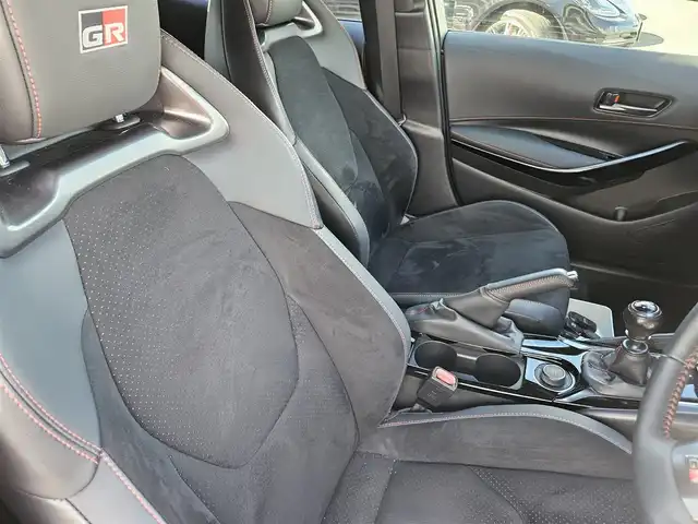 トヨタ ＧＲカローラ RZ 愛媛県 2023(令5)年 2.3万km グレー 〇４WD/〇純正10.5インチディスプレイオーディオプラス/〇フルセグTV/〇バックカメラ/〇ビルトインETC2.0/〇レーダークルーズコントロール/〇コーナーセンサー/〇セーフティセンス/〇オートマチックハイビーム/〇ターボ/〇LEDヘッドランプ/〇LEDフロントフォグランプ/〇左右独立温度調整オートエアコン/〇革巻きステアリングホイール/〇革巻きシフトノブ/〇レッドステッチ入合皮/ブランノーブコンビプレミアムスポーツシート/〇純正18インチアルミホイール/〇純正カーボンファイバールーフ/〇スマートエントリー/スタートシステム/〇禁煙車