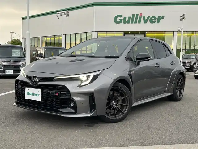 トヨタ ＧＲカローラ RZ 愛媛県 2023(令5)年 2.3万km ガンＭ 登録時走行距離:22537km/4WD/純正10.5型MOPナビ/フルセグTV/バックモニター/ビルトインETC2.0/レーダークルーズコントロール/クリアランスソナー/セーフティセンス/・衝突被害軽減ブレーキ/・車線逸脱防止支援システム/・オートマチックハイビーム/・標識認識システム/・発進遅れ告知機能/IC付ターボ/LEDヘッドランプ/革巻きステアリング/ステアリングヒーター/純正OPハーフレザースポーツシート/前席シートヒーター/JBLサウンドシステム/純正18インチアルミホイール/スマートキー/プッシュエンジンスタート/禁煙車