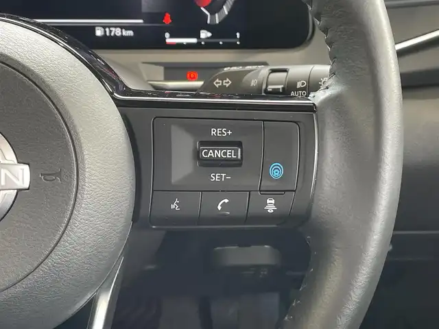 日産 オーラ G レザーエディション 岡山県 2021(令3)年 1.5万km ガーネットレッド/スーパーブラック 2トーン 登録時走行距離14994km/BOSEプレミアムサウンド/置くだけ充電/純正ディスプレイオーディオ/(AM/FM/BT/TV)/エマージェンシーブレーキ/レーンキープアシスト/BSM/クルーズコントロール/オートマチックハイビーム/ビルトインETC2.0/全方位カメラ/ドライブレコーダー/LEDヘッドライト/スペアキー/純正17インチアルミホイール/レザーシート