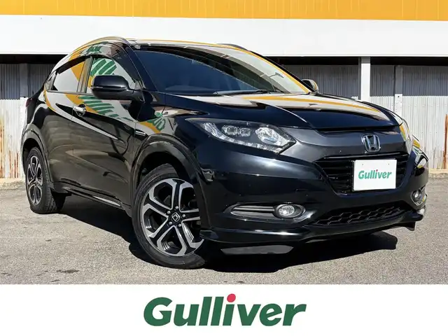 ホンダ ヴェゼル ハイブリッド Z 三重県 2014(平26)年 10.9万km クリスタルブラックパール ワンオーナー/車両接近通報装置/シティブレーキアクティブシステム/クルーズコントロール/純正インターナビ/　・Bluetooth/　・フルセグTV/　・HDMI/　・DVD/CD再生/　・USB/ルーフレール/パドルシフト/スマートキー/プッシュスタート/黒レザーシート/前席シートヒーター/LEDヘッドライト/フォグライト/オートライト/革巻きステアリング/ステアリングスイッチ/ビルトインETC/電動格納ミラー/ウィンカーミラー/電子パーキングブレーキ/オートブレーキホールド/オートワイパー/フロアマット/ドアバイザー/プライバシーガラス/横滑り防止機能/サイド/カーテンエアバック