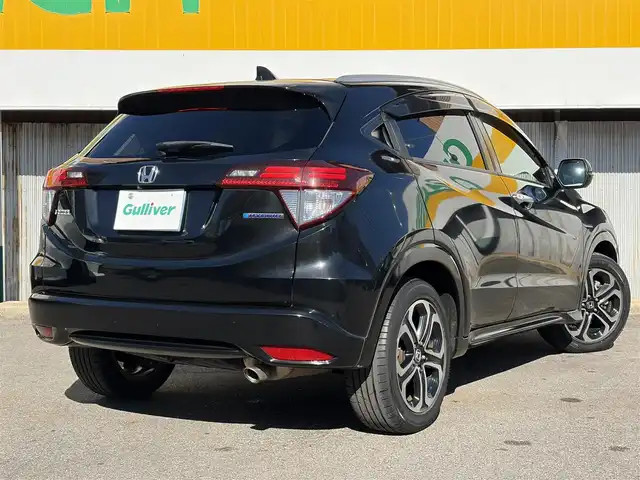 ホンダ ヴェゼル ハイブリッド Z 三重県 2014(平26)年 10.9万km クリスタルブラックパール ワンオーナー/車両接近通報装置/シティブレーキアクティブシステム/クルーズコントロール/純正インターナビ/　・Bluetooth/　・フルセグTV/　・HDMI/　・DVD/CD再生/　・USB/ルーフレール/パドルシフト/スマートキー/プッシュスタート/黒レザーシート/前席シートヒーター/LEDヘッドライト/フォグライト/オートライト/革巻きステアリング/ステアリングスイッチ/ビルトインETC/電動格納ミラー/ウィンカーミラー/電子パーキングブレーキ/オートブレーキホールド/オートワイパー/フロアマット/ドアバイザー/プライバシーガラス/横滑り防止機能/サイド/カーテンエアバック