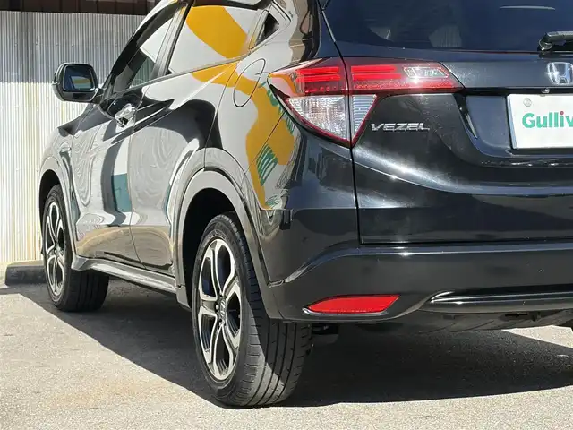 ホンダ ヴェゼル ハイブリッド Z 三重県 2014(平26)年 10.9万km クリスタルブラックパール ワンオーナー/車両接近通報装置/シティブレーキアクティブシステム/クルーズコントロール/純正インターナビ/　・Bluetooth/　・フルセグTV/　・HDMI/　・DVD/CD再生/　・USB/ルーフレール/パドルシフト/スマートキー/プッシュスタート/黒レザーシート/前席シートヒーター/LEDヘッドライト/フォグライト/オートライト/革巻きステアリング/ステアリングスイッチ/ビルトインETC/電動格納ミラー/ウィンカーミラー/電子パーキングブレーキ/オートブレーキホールド/オートワイパー/フロアマット/ドアバイザー/プライバシーガラス/横滑り防止機能/サイド/カーテンエアバック