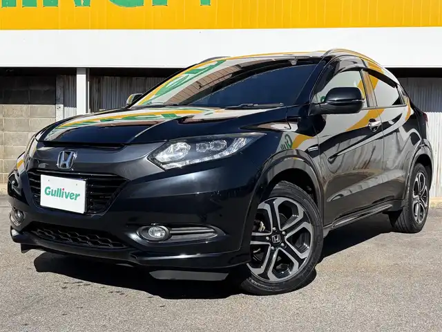 ホンダ ヴェゼル ハイブリッド Z 三重県 2014(平26)年 10.9万km クリスタルブラックパール ワンオーナー/車両接近通報装置/シティブレーキアクティブシステム/クルーズコントロール/純正インターナビ/　・Bluetooth/　・フルセグTV/　・HDMI/　・DVD/CD再生/　・USB/ルーフレール/パドルシフト/スマートキー/プッシュスタート/黒レザーシート/前席シートヒーター/LEDヘッドライト/フォグライト/オートライト/革巻きステアリング/ステアリングスイッチ/ビルトインETC/電動格納ミラー/ウィンカーミラー/電子パーキングブレーキ/オートブレーキホールド/オートワイパー/フロアマット/ドアバイザー/プライバシーガラス/横滑り防止機能/サイド/カーテンエアバック