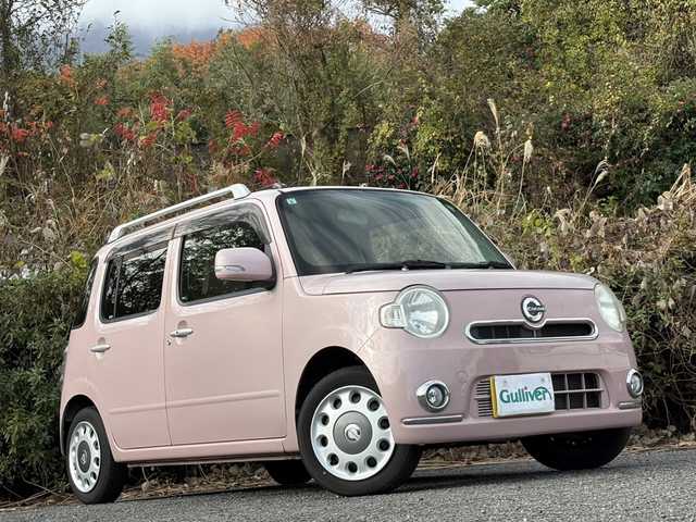 ダイハツ ミラ ココア プラスX 大分県 2013(平25)年 12.3万km ムースピンクパール 社外メモリーナビ/地デジ/Bluetooth/DVD/スマートキー/アイドリングストップ