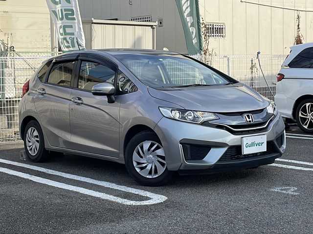 ホンダ フィット 13G Fパッケージ 兵庫県 2014(平26)年 7.8万km ティンテッドシルバーM ワンオーナー/純正インターナビ/CD/DVD/フルセグTV/Bluetooth/HDMI/バックカメラ/LEDヘッドランプ/オートライト/スマートキー/エンジンプッシュスタート/ビルトインETC/社外AW付スタッドレスタイヤ4本積込（約5部山）/保証書/取説/スペアキー1本