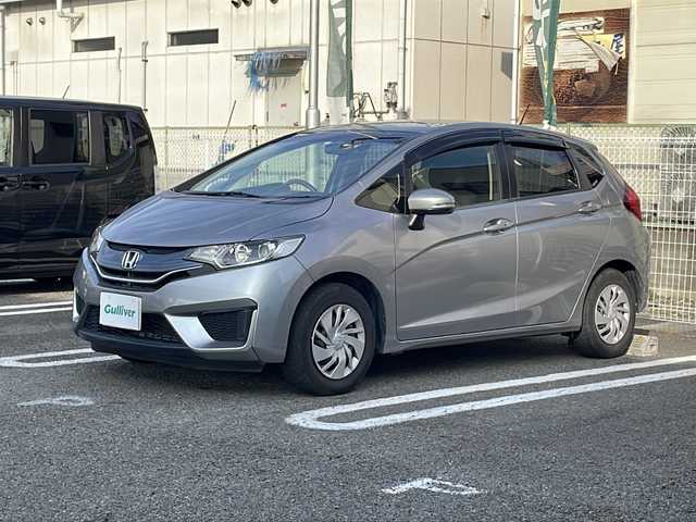 ホンダ フィット 13G Fパッケージ 兵庫県 2014(平26)年 7.8万km ティンテッドシルバーM ワンオーナー/純正インターナビ/CD/DVD/フルセグTV/Bluetooth/HDMI/バックカメラ/LEDヘッドランプ/オートライト/スマートキー/エンジンプッシュスタート/ビルトインETC/社外AW付スタッドレスタイヤ4本積込（約5部山）/保証書/取説/スペアキー1本