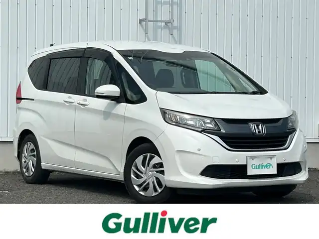 ホンダ フリード G ホンダセンシング 熊本県 2018(平30)年 8万km ホワイトオーキッドパール 純正SDナビDTV/・CD/DVD/SD/BT/フルセグ/バックカメラ/両側パワースライドドア/ドライブレコーダー/LEDライト/ビルトインETC/ウィンカードアミラー/ステアリングリモコン/ACC/ホンダセンシング/・衝突軽減ブレーキ/・誤発進抑制機能/・歩行者事故低減ステアリング/・路外逸脱抑制機能/・アダプティブクルーズコントロール/木目調パネル/マット/バイザー/スマートキー/保証書/取説/スマートキー