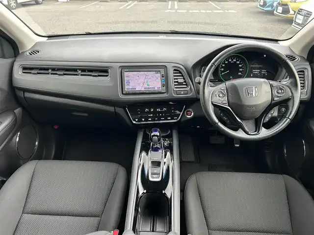 ホンダ ヴェゼル ハイブリッド X ホンダセンシング 愛知県 2016(平28)年 2.8万km モルフォブルーP /ワンオーナー//純正メモリナビ//純正フルセグTV//DVD/CD/FM/AM/iPod/SD/USB/BT//バックカメラ//ドライブレコーダー//ビルトインETC//Honda SENSING//衝突被害軽減ブレーキ//歩行者事故低減ステアリング//追従機能付きクルーズコントロール//レーンアシスト//路外逸脱抑制機能//誤発進抑制機能//先行車発進お知らせ機能//標識認識機能//電動パーキングブレーキ//オートブレーキホールド//ECONスイッチ//SPORT MODE//ステアスイッチ//パドルシフト//ガンメタ塗装ボディロアガーニッシュ//オートリトラミラー//純正フロアマット//純正16インチアルミホイール//純正LEDオートライト//フロントフォグランプ//ライト付きバニティミラー//自動防眩ミラー//ISOFIX//イモビライザー//ダブル/サイド/カーテンエアバック//スマートキー//スペアキー１本//取扱説明書//ナビ説明書//保証書//記録簿(H29/H30/R5)