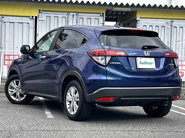 ホンダ ヴェゼル ハイブリッド X ホンダセンシング 愛知県 2016(平28)年 2.8万km モルフォブルーP /ワンオーナー//純正メモリナビ//純正フルセグTV//DVD/CD/FM/AM/iPod/SD/USB/BT//バックカメラ//ドライブレコーダー//ビルトインETC//Honda SENSING//衝突被害軽減ブレーキ//歩行者事故低減ステアリング//追従機能付きクルーズコントロール//レーンアシスト//路外逸脱抑制機能//誤発進抑制機能//先行車発進お知らせ機能//標識認識機能//電動パーキングブレーキ//オートブレーキホールド//ECONスイッチ//SPORT MODE//ステアスイッチ//パドルシフト//ガンメタ塗装ボディロアガーニッシュ//オートリトラミラー//純正フロアマット//純正16インチアルミホイール//純正LEDオートライト//フロントフォグランプ//ライト付きバニティミラー//自動防眩ミラー//ISOFIX//イモビライザー//ダブル/サイド/カーテンエアバック//スマートキー//スペアキー１本//取扱説明書//ナビ説明書//保証書//記録簿(H29/H30/R5)