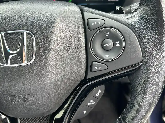 ホンダ ヴェゼル ハイブリッド X ホンダセンシング 愛知県 2016(平28)年 2.8万km モルフォブルーP /ワンオーナー//純正メモリナビ//純正フルセグTV//DVD/CD/FM/AM/iPod/SD/USB/BT//バックカメラ//ドライブレコーダー//ビルトインETC//Honda SENSING//衝突被害軽減ブレーキ//歩行者事故低減ステアリング//追従機能付きクルーズコントロール//レーンアシスト//路外逸脱抑制機能//誤発進抑制機能//先行車発進お知らせ機能//標識認識機能//電動パーキングブレーキ//オートブレーキホールド//ECONスイッチ//SPORT MODE//ステアスイッチ//パドルシフト//ガンメタ塗装ボディロアガーニッシュ//オートリトラミラー//純正フロアマット//純正16インチアルミホイール//純正LEDオートライト//フロントフォグランプ//ライト付きバニティミラー//自動防眩ミラー//ISOFIX//イモビライザー//ダブル/サイド/カーテンエアバック//スマートキー//スペアキー１本//取扱説明書//ナビ説明書//保証書//記録簿(H29/H30/R5)