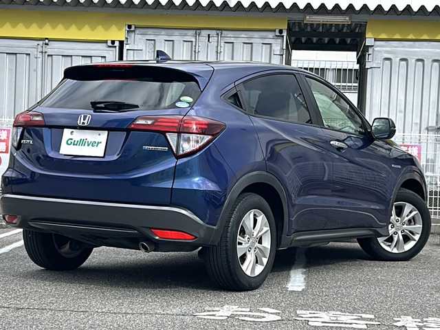 ホンダ ヴェゼル ハイブリッド X ホンダセンシング 愛知県 2016(平28)年 2.8万km モルフォブルーP /ワンオーナー//純正メモリナビ//純正フルセグTV//DVD/CD/FM/AM/iPod/SD/USB/BT//バックカメラ//ドライブレコーダー//ビルトインETC//Honda SENSING//衝突被害軽減ブレーキ//歩行者事故低減ステアリング//追従機能付きクルーズコントロール//レーンアシスト//路外逸脱抑制機能//誤発進抑制機能//先行車発進お知らせ機能//標識認識機能//電動パーキングブレーキ//オートブレーキホールド//ECONスイッチ//SPORT MODE//ステアスイッチ//パドルシフト//ガンメタ塗装ボディロアガーニッシュ//オートリトラミラー//純正フロアマット//純正16インチアルミホイール//純正LEDオートライト//フロントフォグランプ//ライト付きバニティミラー//自動防眩ミラー//ISOFIX//イモビライザー//ダブル/サイド/カーテンエアバック//スマートキー//スペアキー１本//取扱説明書//ナビ説明書//保証書//記録簿(H29/H30/R5)