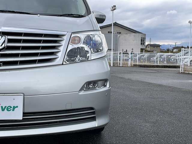 トヨタ アルファード Ｖ MZ 富山県 2004(平16)年 8.9万km ダークグレーマイカメタリック 4WD/社外SDナビ/フルセグ/Bluetooth/バックカメラ/ETC/両側パワースライドドア/イージークローザーリアゲート/レーンアシスト/社外19インチAW