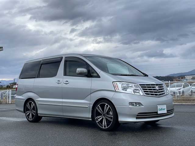 トヨタ アルファード Ｖ MZ 富山県 2004(平16)年 8.9万km ダークグレーマイカメタリック 4WD/社外SDナビ/フルセグ/Bluetooth/バックカメラ/ETC/両側パワースライドドア/イージークローザーリアゲート/レーンアシスト/社外19インチAW