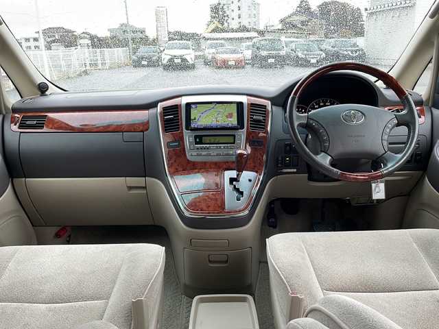 トヨタ アルファード Ｖ MZ 富山県 2004(平16)年 8.9万km ダークグレーマイカメタリック 4WD/社外SDナビ/フルセグ/Bluetooth/バックカメラ/ETC/両側パワースライドドア/イージークローザーリアゲート/レーンアシスト/社外19インチAW