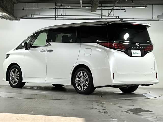トヨタ アルファードハイブリット Z 広島県 2024(令6)年 1.5万km プラチナホワイトパールマイカ 禁煙/左右独立ムーンルーフ/セーフティセンス/・プリクラッシュセーフティ/・レーントレーシングアシスト/・レーダークルーズコントロール/・アダプティブハイビーム/・ロードサインアシスト/・ドライバー異常時対応/・プロアクティブドライビングアシスト/・発進遅れ告知機能/BSM/パーキングサポートブレーキ/純正14インチディスプレイ/ナビ/・FM/AM/Bluetooth/USB/フルセグ/・Miracast/MDMI/Applecarplay/androidauto/・ETC2.0/パノラミックビューモニター/フリップダウンモニター/HUD/両側パワースライドドア/パワーバックドア/シートヒーター/ベンチレーション/パワーシート/メモリーシート/ステアリングヒーター/ドライブレコーダー(TZ-D203MW)/おくだけ充電/フロアマット/AC100V1500W