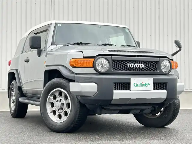 トヨタ ＦＪクルーザー 群馬県 2011(平23)年 12.3万km グレーメタリック/ホワイト 4WD/純正SDナビ/（CD/DVD/Bluetooth/フルセグ）/バックカメラ/クルーズコントロール/アクティブトラクションコントロールシステム/ステアリングリモコン/ライトレベライザー/ETC/社外マフラー(ROSSOMODELLO)/純正マフラー積込み/純正フロアマット/純正ドアバイザー/Fコーナーセンサー/LED
