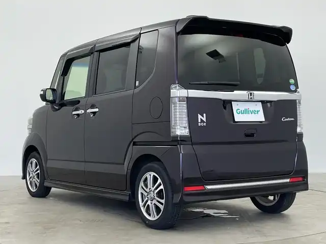 ホンダ Ｎ ＢＯＸ カスタム G SSパッケージ 鹿児島県 2015(平27)年 6.8万km プレミアムベルベットパープル・パール あんしんパッケージ/社外SDナビ/DVD再生可/ワンセグTV/両側電動スライドドア/ステアリングスイッチ/HIDヘッドライト/オートライトコントロール/リアサンシェード/純正14インチアルミホイール/スマートキー×2/エンジンプッシュスタート/純正フロアマット