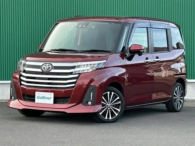 トヨタ ルーミー カスタムG－T 宮城県 2021(令3)年 1.5万km ファイアークォーツレッドM スマートアシスト/・衝突回避支援ブレーキ機能/・衝突警報機能/・車線逸脱警報機能/・ふらつき警報/・ブレーキ制御機能付誤発進抑制機能/・サイドビューランプ/・先行車発進お知らせ機能/・コーナーセンサー/・アダプティブドライビングビーム/・路側逸脱警報/・アダプティブクルーズコントロール/・標識認識機能/純正ナビ（NSZT-W68T）/・CD/DVD/・Bluetooth/・フルセグTV/バックカメラ/ビルトインETC/ドライブレコーダー/ウェルカムパワースライドドア（運転席側/助手席側）/革巻きステアリング/ステアリングスイッチ/電動パーキングブレーキ/ブレーキホールド/LEDヘッドランプ/フォグランプ/オートライト/スマートキー＆プッシュスタート/スペアキー1本/電動格納ミラー/純正15インチAW/フロアマット/ドアバイザー/Wエアバッグ