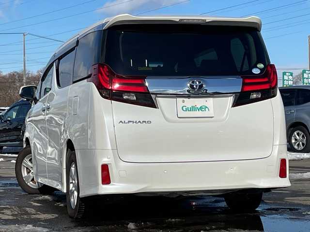トヨタ アルファード S Aパッケージ 道央・札幌 2015(平27)年 7.5万km ホワイトパールクリスタルシャイン ４WD/純正SDナビ/純正フリップダウンモニター/横滑り防止装置/クルーズコントロール/クリアランスソナー/バックカメラ/ビルトインETC/アイドリングストップ/ECOMODE/両側パワースライドドア/N席/２列目オットマン/革巻きステアリング/ステアリングリモコン/AC100V/電動パーキング/ブレーキホールド/MTモード付AT/プッシュスタート/スマートキー/LEDヘッドライト/オートライト/フォグランプ/電動格納ミラー/ウィンカーミラー/ドアバイザー/スペアキー
