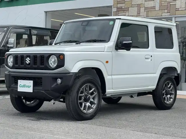 スズキ ジムニー XC 徳島県 2024(令6)年 0.1万km未満 ピュアホワイトP スズキセーフティサポート/盗難防止措置/クルーズコントロール/ダウンアシストコントロール/４WD/ターボエンジン/シートヒーター（D/N席）/オートライト/スマートキー/フォグライト/LEDヘッドライト/プッシュスタート