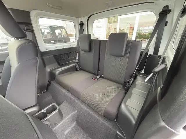 スズキ ジムニー XC 徳島県 2024(令6)年 0.1万km未満 ピュアホワイトP スズキセーフティサポート/盗難防止措置/クルーズコントロール/ダウンアシストコントロール/４WD/ターボエンジン/シートヒーター（D/N席）/オートライト/スマートキー/フォグライト/LEDヘッドライト/プッシュスタート