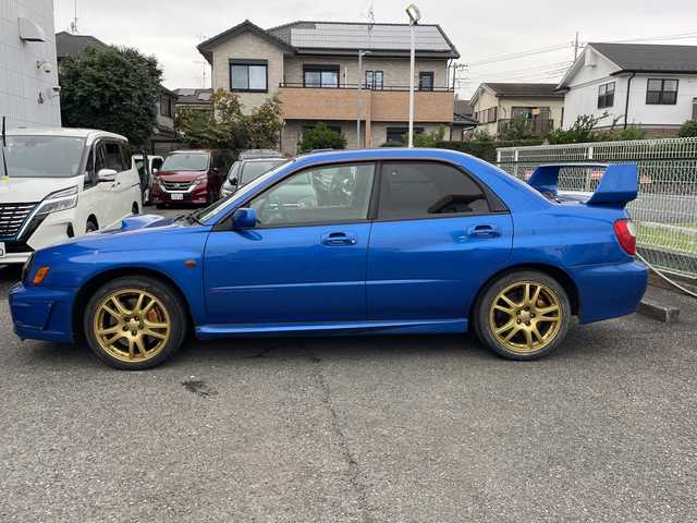 スバル インプレッサ ＷＲＸ STi プロドライブスタイル 神奈川県 2002(平14)年 11.7万km WRブルーマイカ ルーフベンチレータ/電動格納ミラー/ヘッドライトレべライザー/STIマフラー/ケンウッドツイーター/STIタワーバー/ラリー風バンパー/リモコンキー/スペアキー/HIDライト/ETC/純正フロアマット/純正ヘッドライトガーニッシュ
