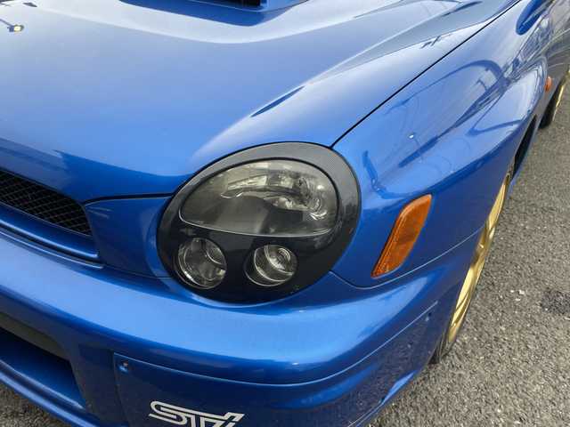 スバル インプレッサ ＷＲＸ STi プロドライブスタイル 神奈川県 2002(平14)年 11.7万km WRブルーマイカ ルーフベンチレータ/電動格納ミラー/ヘッドライトレべライザー/STIマフラー/ケンウッドツイーター/STIタワーバー/ラリー風バンパー/リモコンキー/スペアキー/HIDライト/ETC/純正フロアマット/純正ヘッドライトガーニッシュ