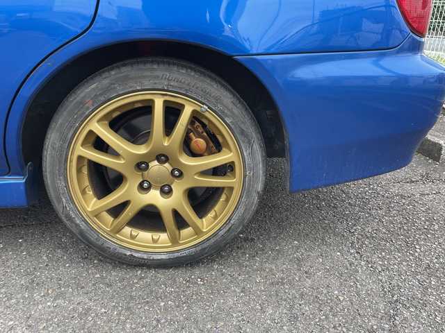 スバル インプレッサ ＷＲＸ STi プロドライブスタイル 神奈川県 2002(平14)年 11.7万km WRブルーマイカ ルーフベンチレータ/電動格納ミラー/ヘッドライトレべライザー/STIマフラー/ケンウッドツイーター/STIタワーバー/ラリー風バンパー/リモコンキー/スペアキー/HIDライト/ETC/純正フロアマット/純正ヘッドライトガーニッシュ