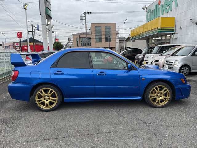 スバル インプレッサ ＷＲＸ STi プロドライブスタイル 神奈川県 2002(平14)年 11.7万km WRブルーマイカ ルーフベンチレータ/電動格納ミラー/ヘッドライトレべライザー/STIマフラー/ケンウッドツイーター/STIタワーバー/ラリー風バンパー/リモコンキー/スペアキー/HIDライト/ETC/純正フロアマット/純正ヘッドライトガーニッシュ