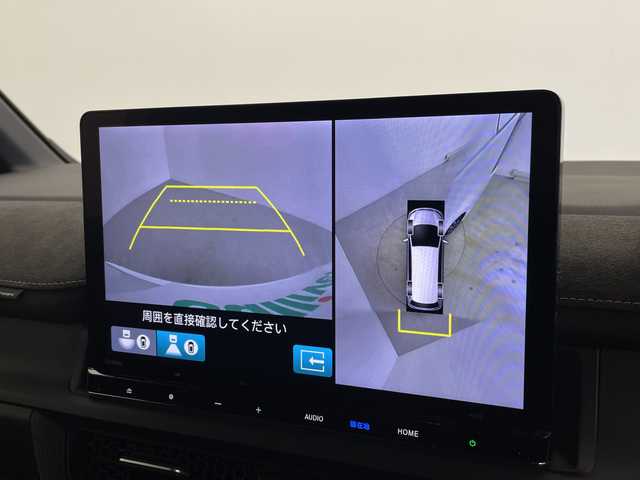 ホンダ ステップワゴン スパーダ eHEV プレミアムライン 鹿児島県 2023(令5)年 0.8万km プラチナホワイトパール 純正11インチナビ/（Bluetooth/フルセグTV/CD/DVD/USB接続）/純正フリップダウンモニター/マルチビューカメラ/パワーバックドア/パドルシフト/レーダークルーズコントロール/両側パワースライドドア/BSM/ハーフレザーシート/オットマン/オートライト/MUGENフロントグリル/ETC/前後ドライブレコーダー/純正フロアマット/純正17インチAW/スペアキー/AAC