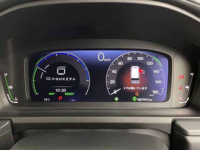 ホンダ ステップワゴン スパーダ eHEV プレミアムライン 鹿児島県 2023(令5)年 0.8万km プラチナホワイトパール 純正11インチナビ/（Bluetooth/フルセグTV/CD/DVD/USB接続）/純正フリップダウンモニター/マルチビューカメラ/パワーバックドア/パドルシフト/レーダークルーズコントロール/両側パワースライドドア/BSM/ハーフレザーシート/オットマン/オートライト/MUGENフロントグリル/ETC/前後ドライブレコーダー/純正フロアマット/純正17インチAW/スペアキー/AAC