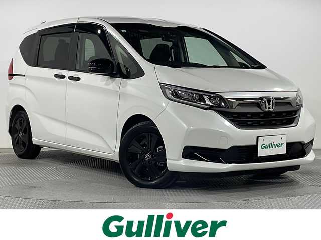 ホンダ フリード G ブラックスタイル 広島県 2023(令5)年 2.9万km プラチナホワイトパール 純正９型ナビ　/両側パワースライドドア　/シートヒーター　/レーダークルーズコントロール　/バックカメラ　/フルセグ　/レーンキープアシスト　/オートライト　/衝突軽減　/コーナーセンサー　/ETC　/ドライブレコーダー/純正１５インチアルミホイール(185/65/R15)/エアバック（運転席/助手席）