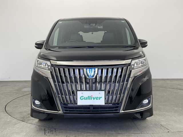 トヨタ エスクァイア ハイブリッド Gi プレミアムパッケージ ブラックテーラード 兵庫県 2019(令1)年 2万km ブラック ・純正9インチナビ＆TV＆BT＆CD＆DVD＆SD/・両側パワースライドドア/・ハーフレザーシート/・シートヒーター/・トヨタセーフティセンス/・プリクラッシュセーフティ/・レーンディパーチャーアラート/・オートマチックハイビーム/・クリアランスソナー/・クルーズコントロール/・先行車発進告知機能/・車両接近通報装置/・ステアリングヒーター/・LEDヘッドライト/・自動防眩ミラー/・前後ドライブレコーダー/・ビルトインETC/・ステアリングリモコン/・TRC/・スマートキー