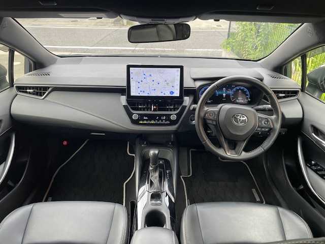 トヨタ カローラツーリング ハイブリッド ダブルバイビー 愛知県 2023(令5)年 3.4万km マッシブグレー ワンオーナー/バックカメラ/ETC2.0/純正メモリーナビ/Bluetooth/フルセグTV/追従クルーズコントロール/前後コーナーセンサー/シートヒーターD＋N席/ハンドルヒーター/純正フロアマット/純正アルミホイール/ABS/レーンキープアシスト/オートライト/オートマチックハイビーム/衝突被害軽減システム/カーテンエアバック/スマートキー/保証書/取扱説明書