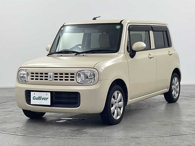 スズキ ラパン X 群馬県 2013(平25)年 6.1万km ミルクティーベージュメタリック 純正オーディオ　スマートキー　プッシュスタート　アイドリングストップ　ヘッドライトレベライザー　純正１４インチアルミホイール　バニティミラー　電動格納ミラー　シガーソケット　パワーウィンドウ　禁煙車