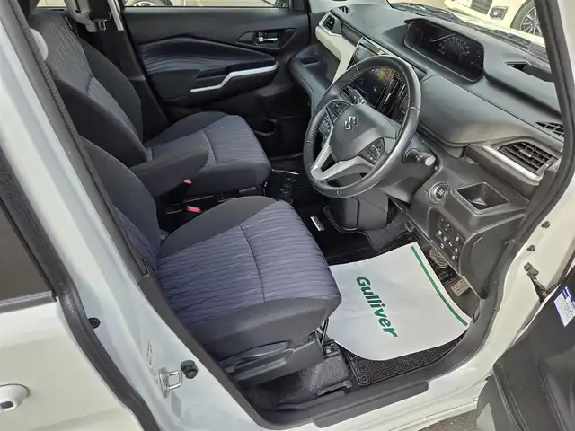 スズキ ソリオ HV MZ 鹿児島県 2021(令3)年 4万km ピュアホワイトP アダプティブクルーズコントロール　/純正オプション１０インチＳＤナビ　/全方位モニター　/Ｂｌｕｅｔｏｏｔｈオーディオ　/フルセグテレビ/カラーヘッドアップディスプレイ　/Ｄ＋Ｎ席シートヒーター　/スズキセーフティサポート/両側パワースライドドア/前後純正ドライブレコーダー/前後コーナーセンサー/横滑り防止装置/レーンキープアシスト/純正アルミホイール(15インチ)/プッシュスタート/スマートキー/エアバッグ(W+サイド)