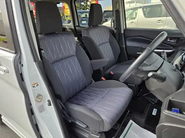 スズキ ソリオ HV MZ 鹿児島県 2021(令3)年 4万km ピュアホワイトP アダプティブクルーズコントロール　/純正オプション１０インチＳＤナビ　/全方位モニター　/Ｂｌｕｅｔｏｏｔｈオーディオ　/フルセグテレビ/カラーヘッドアップディスプレイ　/Ｄ＋Ｎ席シートヒーター　/スズキセーフティサポート/両側パワースライドドア/前後純正ドライブレコーダー/前後コーナーセンサー/横滑り防止装置/レーンキープアシスト/純正アルミホイール(15インチ)/プッシュスタート/スマートキー/エアバッグ(W+サイド)