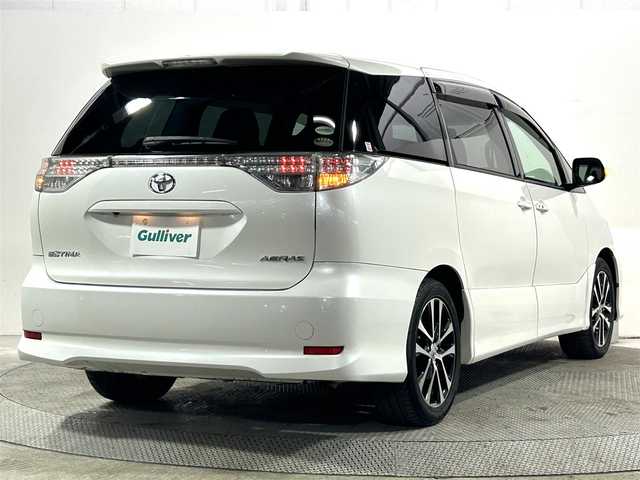 トヨタ エスティマ アエラス 大阪府 2013(平25)年 2.2万km ホワイトパールクリスタルシャイン 純正ナビ(フルセグ/DVD再生/Bluetooth) バックカメラ ETC 両側パワースライドドア クルコン オートライト スマートキー プッシュスタート HIDヘッドライト オットマン