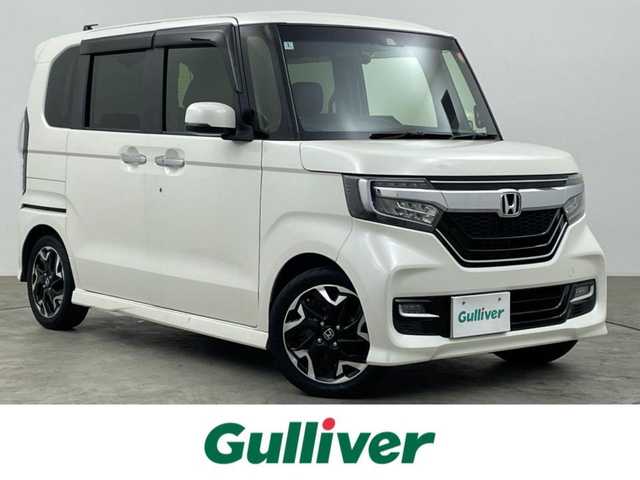 ホンダ Ｎ ＢＯＸ カスタム G L ターボ ホンダセンシング 大分県 2018(平30)年 10.8万km プレミアムホワイトパールⅡ ワンオーナー/ターボ車/ホンダセンシング搭載/・衝突軽減ブレーキ（CMBS）/・誤発進抑制機能/・後方誤発進抑制機能/・歩行者事故低減ステアリング/・路外逸脱抑制機能/・ACC（アダプティブクルーズコントロール）/・LKAS（車線維持支援システム）/・オートハイビーム/・先行車発進お知らせ機能/・標識認識機能/純正CDオーディオ　型式：WX-171CP/【ワンセグTV、HDMI、BT対応、USB】/ステアリングスイッチ/バックカメラ/両側電動スライドドア/ビルトインETC/社外ドライブレコーダー（前後）/ハーフレザーシート/パドルシフト/アイドリングストップ/横滑り防止装置/電動格納ミラー/純正フロアマット/オートライト/LEDヘッドライト/LEDフォグ/純正15インチアルミホイール/保証書、取説、スペアキー有り