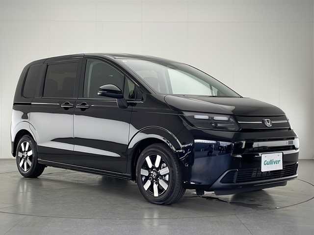ホンダ フリード ハイブリット e:HEV AIR EX 宮崎県 2025(令7)年 0.1千km クリスタルブラックパール 登録済み未使用車/ホンダセンシング/純正9型ディスプレイオーディオナビTV/（LXM-242ZFNI/Bluetooth/FMAM/フルセグTV)/純正バックカメラ/純正LEDオートライト/純正15インチアルミ/両側電動スライドドア/アダプティブクルーズコントロール/レーンディパーチャーアラート/ブラインドスポットモニター/クリアランスソナー/電子パーキング/オートホールド/オートエアコン/前席シートヒーター/ハーフレザーシート/スマートキー/プッシュエンジンスタート/スペアキー/新車時保証書/取扱い説明書