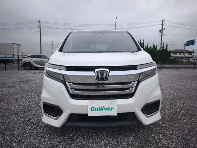 ホンダ ステップワゴン スパーダ ハイブリッド G EX ホンダセンシング 富山県 2018(平30)年 3.9万km プラチナホワイトパール 〇純正ナビ/〇フルセグTV/〇両側パワースライドドア/〇バックカメラ/〇ビルトインETC/〇アダプティプクルーズコントロール/〇ホンダセンシング/〇SRSエアバッグ/〇LEDヘッドランプ/〇LEDフロントフォグランプ/〇革巻きステアリングホイール/〇ソフトウィーブ/合皮コンビシート/〇シートヒーター/シートバックテーブル/〇ロールサンシェード/〇充電用USB端子/〇純正16インチアルミホイール/〇スマートキーシステム/〇禁煙車