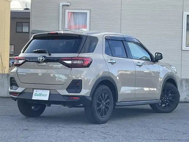 トヨタ ライズ Z 青森県 2023(令5)年 1.6万km ナチュラルベージュマイカM 4WD/寒冷地仕様/ワンオーナー/純正17AW積込（195/60/17）/純正フロアマット/社外ナビ/・AM/FM/CD/DVD/BT/コーナーセンサー/MTモード付AT/シートヒーター前席/トヨタセーフティセンス/・プリクラッシュセーフティ/・レーントレーシングアシスト/・レーダークルーズコントロール/・オートマチックハイビーム/アイドリングストップ/横滑り防止機能/車線逸脱警報/セキュリティアラーム/ETC/ドラレコ/スペアキー/純正スターター/保証書/取扱説明書/整備記録簿