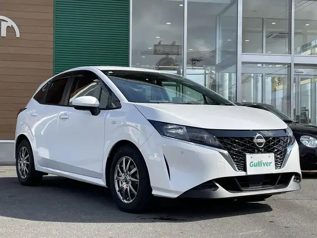 日産 ノート S 道央・札幌 2023(令5)年 3.3万km ピュアホワイトパール ワンオーナー/プッシュスタート/ドアバイザー/コーナーセンサー/横滑り防止装置/盗難防止装置/衝突軽減ブレーキ/ステアリングスイッチ/オートブレーキホールド/ステアリングヒーター/オーディオ(AM/FM/CD/BT)/シートヒーター/オートライト/純正エンジンスターター/スペアキー