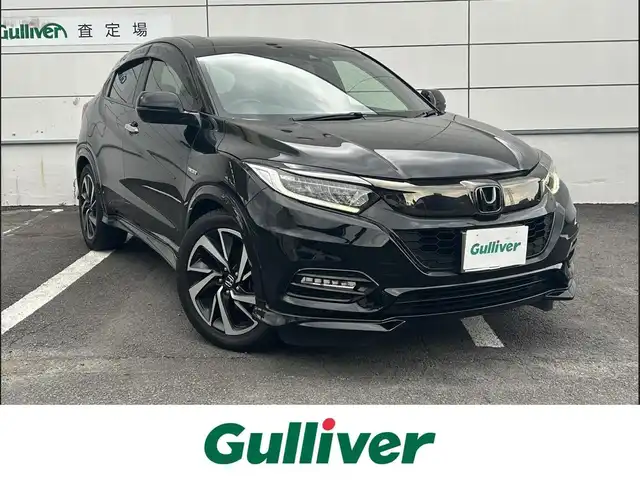 ホンダ ヴェゼル ハイブリッド RS ホンダセンシング 長崎県 2019(令1)年 6.3万km クリスタルブラックパール 純正8インチナビ/（CD/DVD/BT/フルセグ）/バックカメラ/衝突軽減システム/レーンアシスト/ハーフレザーシート/シートヒーター/パドルシフト/レーダークルーズ/ETC/オートライト/純正18インチAW